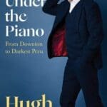 Playing Under the Piano book cover with actor Hugh Bonneville on cover