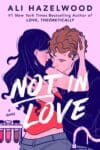 Not in Love by Ali Hazelwood book cover features pink background and couple in an embrace.